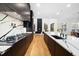 Galley kitchen featuring a center island and marble countertops at 6701 Green Hollow Ct, Wake Forest, NC 27587