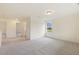 Large bedroom with carpet floors and a window at 85 Kissington Way, Benson, NC 27504