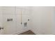 Small laundry room with plenty of space for storage at 85 Kissington Way, Benson, NC 27504