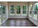 Bright living room with large windows offering ample natural light at 85 Kissington Way, Benson, NC 27504