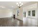 Open-concept living area featuring modern fireplace, recessed lighting, and wood-look floors at 85 Kissington Way, Benson, NC 27504