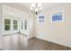 Bright living room with three large windows at 85 Kissington Way, Benson, NC 27504