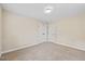 Spacious bedroom with double doors leading to a closet at 8916 Buffalo Gourd Ln, Angier, NC 27501