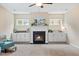 Gathering room featuring a fireplace and ample built-in storage at 8916 Buffalo Gourd Ln, Angier, NC 27501