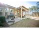 Covered patio with a pergola and built-in grill at 1007 Sounding Ln, Durham, NC 27703