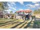 Large backyard with stone wall, gazebo, and privacy fence at 105 Kingfisher Way, Louisburg, NC 27549
