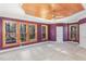 Bright bedroom with wood ceiling, carpet, and multiple windows at 105 Kingfisher Way, Louisburg, NC 27549