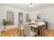 Dining room with table, chairs, and tile floors at 105 Kingfisher Way, Louisburg, NC 27549