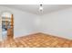 Empty dining room with tile floors and access to the kitchen at 105 Kingfisher Way, Louisburg, NC 27549