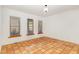 Simple dining room featuring tile floors and large windows at 105 Kingfisher Way, Louisburg, NC 27549