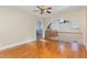 Spacious living room with hardwood floors and views to the lower level at 105 Kingfisher Way, Louisburg, NC 27549