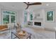 Light and airy living room with fireplace and access to backyard at 1105 Glascock St # 102, Raleigh, NC 27610