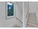 Staircase with a view of the trees outside the window at 1105 Glascock St # 102, Raleigh, NC 27610