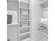 Bright walk-in closet features built-in shelving and organization, maximizing storage space at 1105 Glascock St # 102, Raleigh, NC 27610