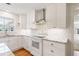 Clean kitchen with white cabinetry, stainless steel appliances, and granite countertops at 127 Fairfield Cir, Dunn, NC 28334