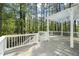 A charming deck has string lights and a nice backyard view at 1408 Ferrell Ct, Creedmoor, NC 27522