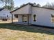 Backyard with covered porch and lots of room for activities at 145 Ottawa Dr, Louisburg, NC 27549