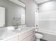 Modern bathroom featuring vanity, mirror, and shower at 145 Ottawa Dr, Louisburg, NC 27549
