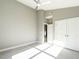 This bedroom features a ceiling fan and closet at 145 Ottawa Dr, Louisburg, NC 27549