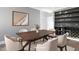 This dining room showcases a lovely table, six chairs, and a built-in bar for elegant entertaining at 145 Ottawa Dr, Louisburg, NC 27549