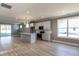 Open kitchen features an island, stainless steel appliances, modern fixtures, and lots of counterspace at 145 Ottawa Dr, Louisburg, NC 27549