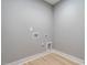 The laundry room features hardwood floors at 145 Ottawa Dr, Louisburg, NC 27549