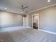 Large main bedroom with plush carpeting and ensuite bathroom access at 145 Ottawa Dr, Louisburg, NC 27549