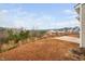 Backyard with patio and view of neighborhood homes at 150 Tympani Ln, Garner, NC 27529