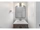Bathroom with a new vanity and decorative mirror and light fixture at 4708 River Boat Landing Ct, Raleigh, NC 27604