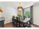 Formal dining room with hardwood floors and chandelier at 4708 River Boat Landing Ct, Raleigh, NC 27604