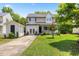 Charming two-story home with a well-manicured lawn and a detached garage at 4708 River Boat Landing Ct, Raleigh, NC 27604