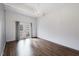 Bright, open living room with hardwood floors and French doors to the backyard at 4708 River Boat Landing Ct, Raleigh, NC 27604
