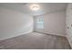 Spacious bedroom featuring neutral walls and carpet at 518 Donnegal Farm Dr, Fuquay Varina, NC 27526