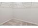 Walk-in closet with wire shelving and carpeting at 518 Donnegal Farm Dr, Fuquay Varina, NC 27526