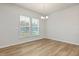 Simple dining area with hardwood floors and natural light at 518 Donnegal Farm Dr, Fuquay Varina, NC 27526