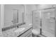 Modern bathroom featuring granite countertops, glass enclosed shower, and a toilet at 630 Contento Ct, Sanford, NC 27330