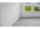 Carpeted bedroom with view to backyard neighborhood at 630 Contento Ct, Sanford, NC 27330
