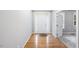 Foyer with hardwood floors, glass door, and view into living space at 630 Contento Ct, Sanford, NC 27330
