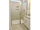 Modern bathroom features a glass shower and a granite sink at 79 Surles Landing Way, Benson, NC 27504