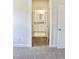 View from the bedroom into the en suite bathroom at 79 Surles Landing Way, Benson, NC 27504