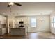 Open concept kitchen with stainless appliances and island at 79 Surles Landing Way, Benson, NC 27504