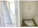 Modern bathroom with tiled shower, a built-in niche, and stylish fixtures at 130 Broadleaf Ln, Louisburg, NC 27549