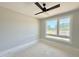 Bedroom with a ceiling fan and a window that offers a scenic view at 130 Broadleaf Ln, Youngsville, NC 27596