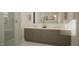 Bathroom featuring double vanity with stone countertop and gold hardware at 135 Cherry Bark Dr, Youngsville, NC 27596