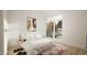 Bright bedroom with cozy seating area, and a stylish accent rug at 135 Cherry Bark Dr, Youngsville, NC 27596