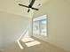 Bright bedroom with large windows and a modern ceiling fan at 135 Cherry Bark Dr, Youngsville, NC 27596