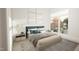 Bright bedroom with a large window, minimalist decor, and a cozy, inviting atmosphere at 135 Cherry Bark Dr, Youngsville, NC 27596