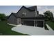 Three-car garage showcasing modern doors with sleek glass panel accents at 135 Cherry Bark Dr, Youngsville, NC 27596