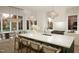 Stunning kitchen island with barstool seating and modern pendant lights, a beautiful culinary space at 135 Cherry Bark Dr, Youngsville, NC 27596
