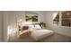 Cozy bedroom featuring a comfortable bed, modern decor, and a large window with natural light at 135 Cherry Bark Dr, Youngsville, NC 27596